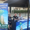 VNNC board members Jeanette Hopp, Howard Benjamin and John Camera with the new VNNC canopy and table 