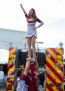 Van Nuys High School Cheerleader held high